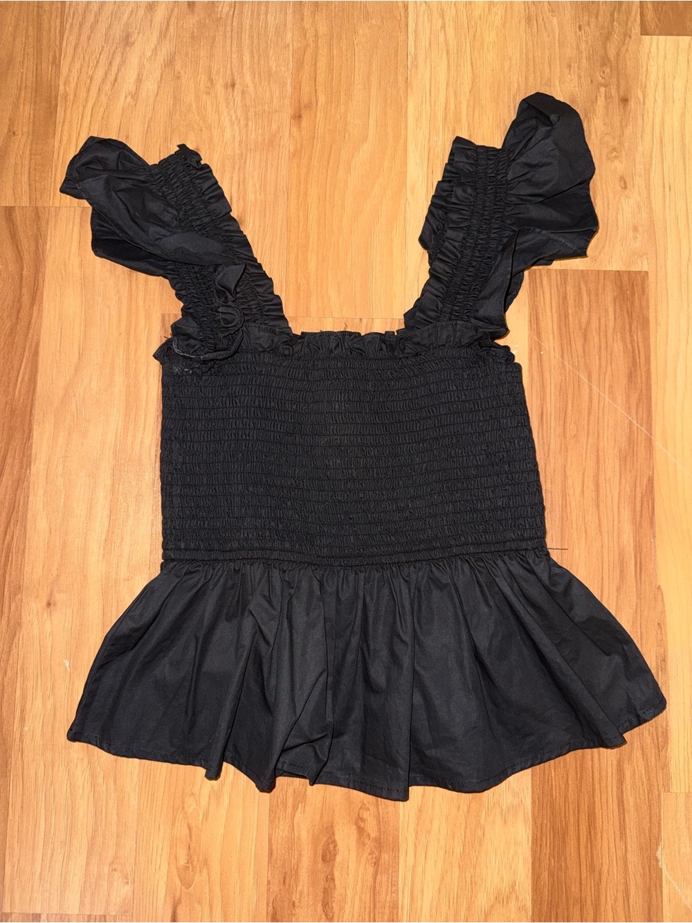 Francesca's Collections Black Smocked Ruffle Peplum Tank